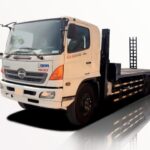 Xe Tải Hino 3 Chân FL Nâng Đầu Chở Máy Chuyên Dùng